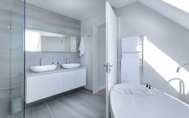 Modernizing bathroom fixtures, such as faucets, shower heads, toilets, lighting, and vanity, can provide a fresh, sleek look preferred by millennials while considering budget constraints.